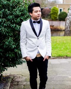 1 White Suit and Black Bow Tie
