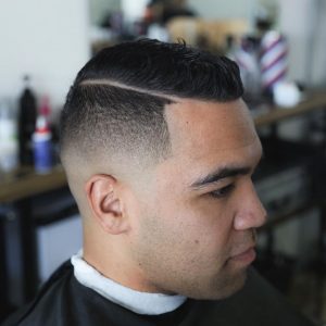 15 Wavy Upswept Top with Razor Line and Skin Fade