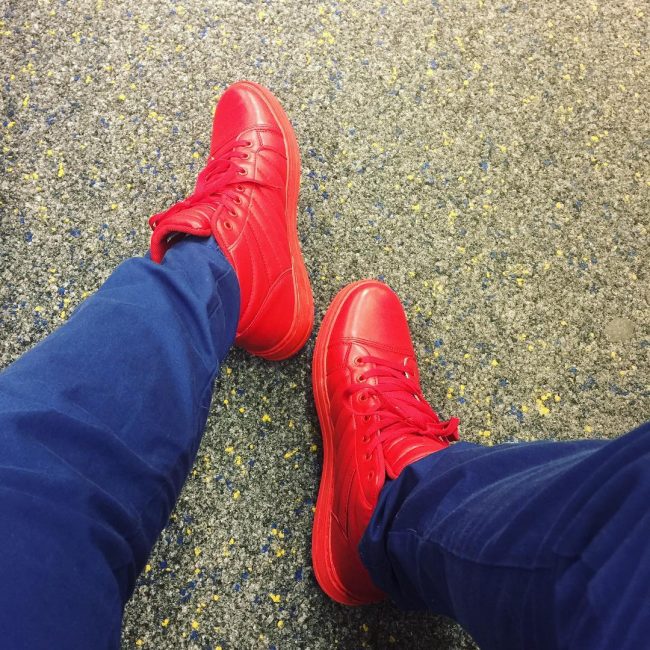 blue jeans and red shoes