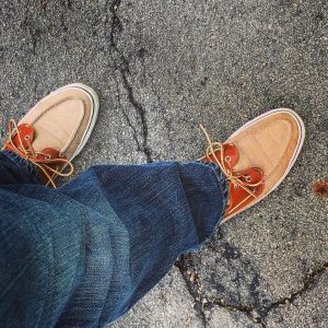 2 Orange- Laced Shoes and Denim Blue Pants