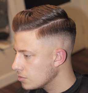 23 Glossy Pomp with Tapered Skin Fade