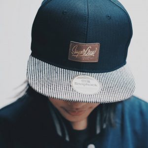 4 Dark Colored Constructed Cap with a Striped Brim