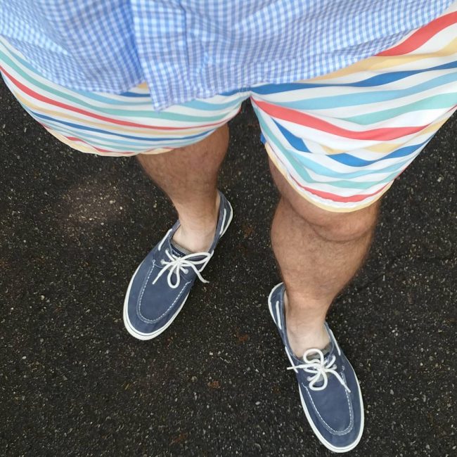 4 Navy Blue Shoes with Multicolored Striped Shorts and Blue Checkered Top